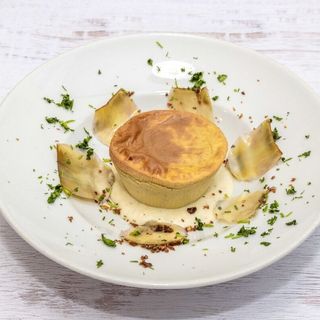 Sformato di carciofi su crema Cacio e Pepe