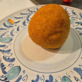 Arancini con prosciutto e mozzarella