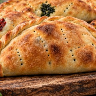 Mezza impanata · Spinaci, ricotta e mozzarella