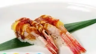 52 Ni flambe amaebi