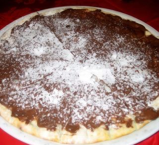 Pizza con Nutella e zucchero a velo