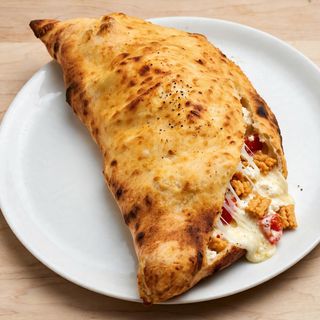 Pizza ripiena fritta al forno