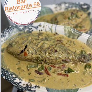 Pescado  con coco +Aroz +platano.