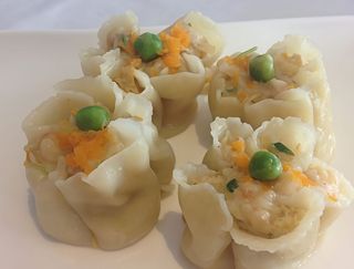 108 Ravioli al vapore con gamberi con carne maiale