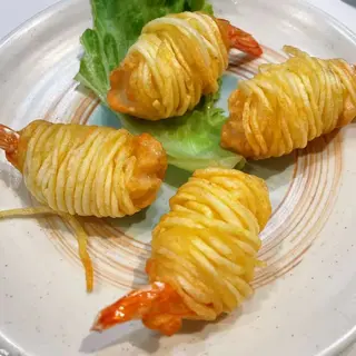 Patate con gamberi