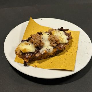 Bruschettina con Radicchio, salsiccia e taleggio