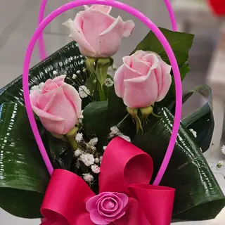 Borsetta con rose rosa