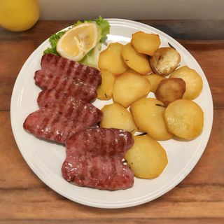 Salsicce di maialino con patate