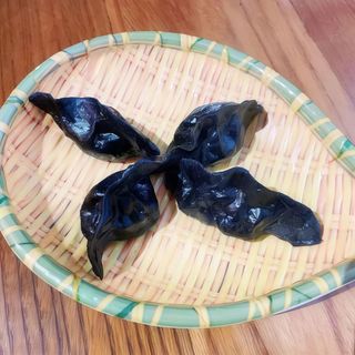 A16 Ravioli al nero di seppia - 4 pezzi