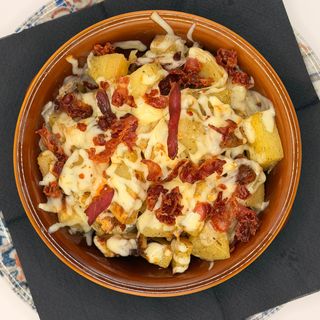 Patate al forno con scamorza e bacon