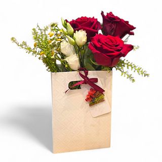 3 roses dans le sac