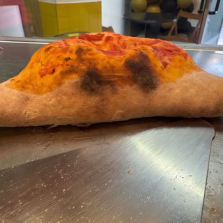 Calzone con prosciutto e funghi