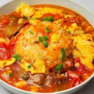 Riso al pomodoro con fettine di manzo