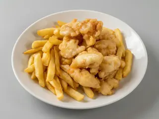 pollo fritti e patate fritti 