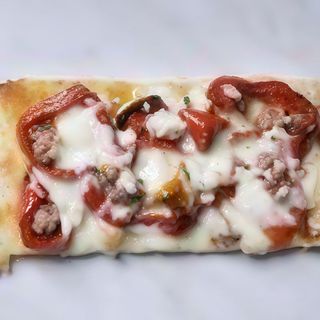 Mezza teglia peperoni e salsiccia