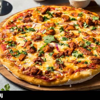 Indian chicken tikka pizza