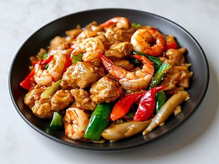 Pollo con gamberi e verdure