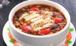 57. Ravioli in salsa piccante