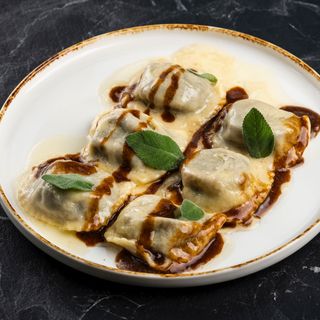 Raviolo di brasato