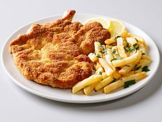 Cotoletta con patatine al forno