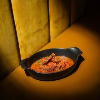 Polpo alla Luciana con datterino rosso