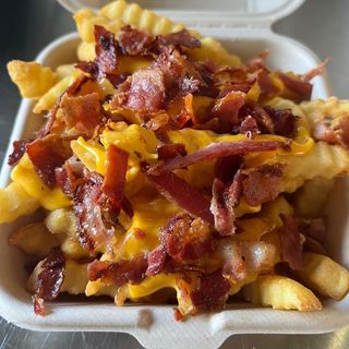 Patate fritte + cheddar + bacon