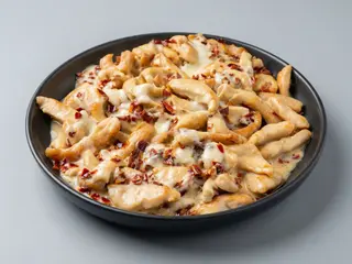Tochetti di pollo, mozzarella, peperoni  cruski