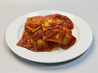 Ravioli ripeno con ricotta e prezzemolo 