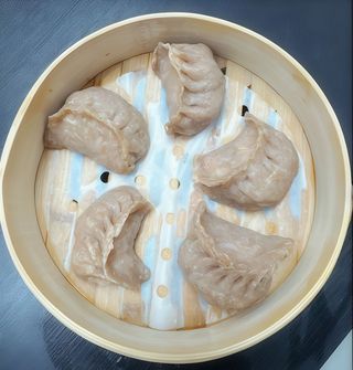 10. Ravioli integrali con pollo al vapore 5 pezzi