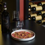 Carpaccio di Black Angus con pistacchio e mandorle