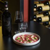 Carpaccio di Black Angus affumicato con parmigiano vacche rosse