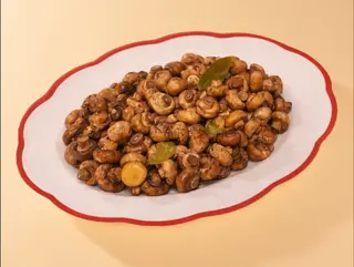 Funghi Champignon arrosto con olio al prezzemolo