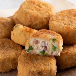 1 timballo di pasta con besciamella, piselli, parmacotto, provola e funghi