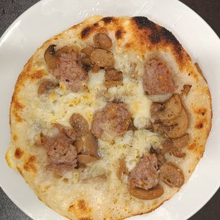 FUNGHI E SALSICCIA AL PIATTO