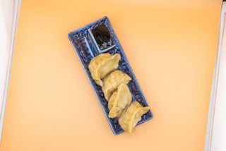 61 Ravioli a vapore con carne di maiale 4 pezzi