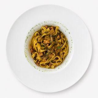 Tagliatelle con salsiccia di norcia e funghi porcini
