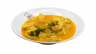 Golden wonton soup