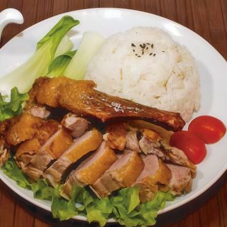 40. Anatra arrosto con riso (non bianco)