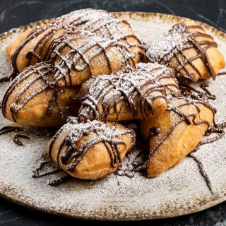 Frittelle nutella e zucchero a velo