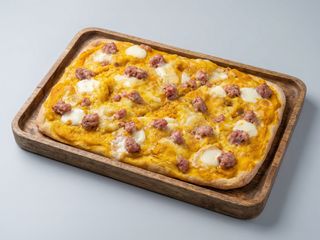 Crema di zucca e salsiccia o pancetta arrotolata