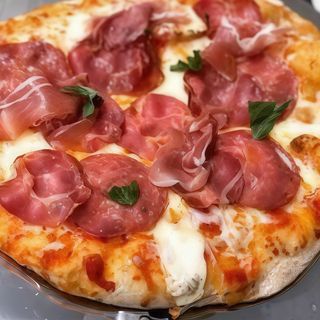 Capocollo di Martina Franca stracciatella di Andria e granella di pistacchio