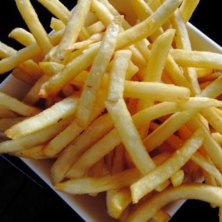 Patatine con porchetta