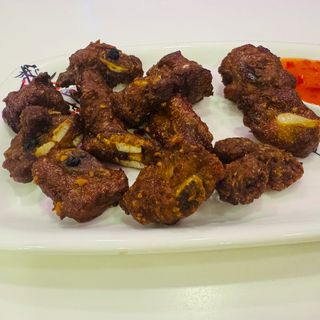 48 Spuntatura di maiale alle cinque spezie