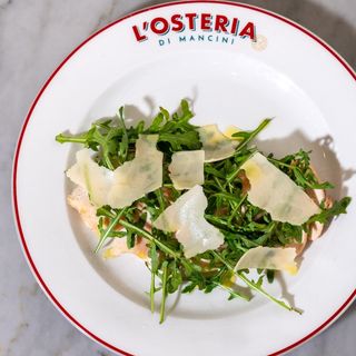 Tagliata di pollo con rucola e grana