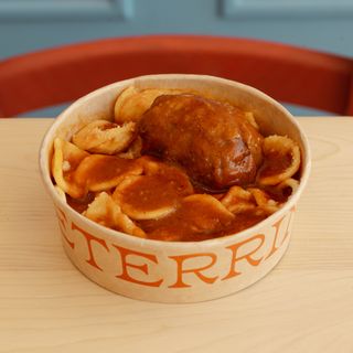 Orecchiette al sugo con braciola.