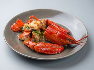 Astice allo zenzero e cipollotto