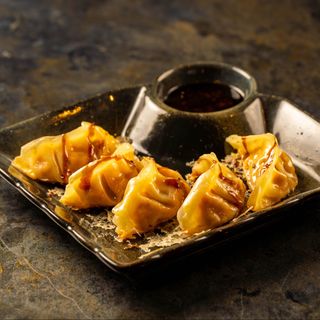 Ravioli di maiale e kimchi alla piastra