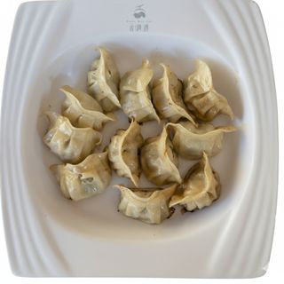  Ravioli di Maiale con Erba Cipollina Cinese (韭菜饺子) 10pz