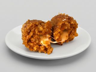 Supplì artigianale al telefono con basilico