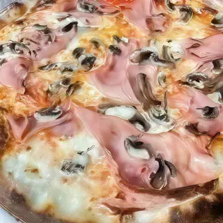 Cotto e funghi